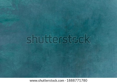 Blue-green grungy backdrop or texture 
