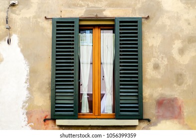 Blue-green Wooden Louvered Window Doors In Pistoia, Province Of Pistoia, Tuscany, Italy.