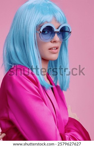 Image, Stock Photo Casual woman in sunglasses leaning against a brick wall