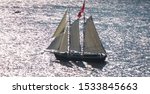 Bluenose II takes sail during the Tall Ship tour of the Great Lakes. Here, it is making waves in full sail along the St. Lawrence. 