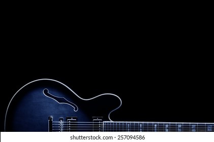 Blues Classic Guitar Shape On Black Background