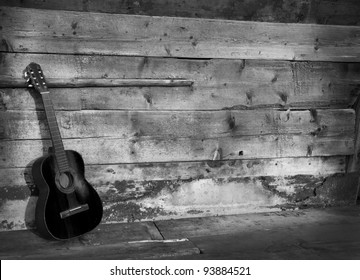 blues guitar the old wooden wall as background horizontal black and white - Powered by Shutterstock