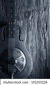 Blues Guitar On Wooden Background