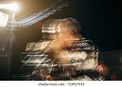 Blues singer plays harmonica