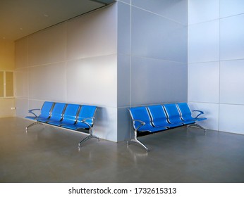 Blues waiting row chair on concrete polishing floor and grey aluminium composite wall back ground. Modern office concept.  - Shutterstock ID 1732615313