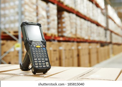 Bluetooth Barcode Scanner In Front Of Modern Warehouse