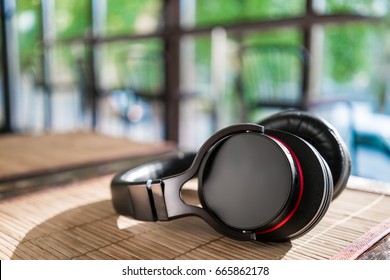 Bluetooth Headphones On Table Cafe