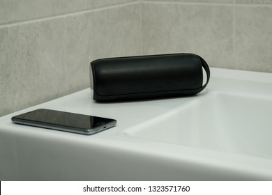 Bluetooth Speaker Plays Music In A Bathroom