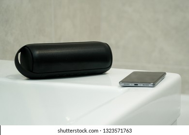 Bluetooth Speaker Plays Music In A Bathroom