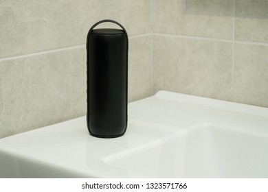 Bluetooth Speaker Plays Music In A Bathroom