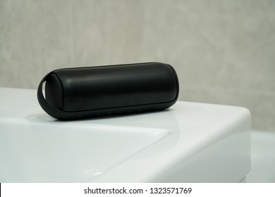 Bluetooth Speaker Plays Music In A Bathroom