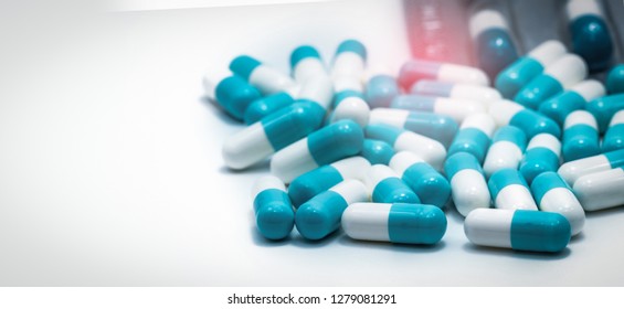 Blue-white Antibiotic Capsule Pills. Pharmaceutical Industry. Prescription Drug. Medicine For Infection. Pharmacy Product. Global Healthcare. Antimicrobial Drug Resistance. Penicillin Capsule Pills.