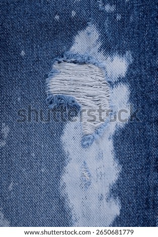 Blue,white  torn jeans. Texture jeans. Pattern blue jeans
