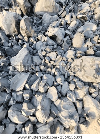 bluey grey rocks located in the desert. Taken at sunset