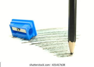 blunt black pencil and blue sharpener white background