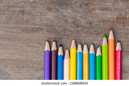blunt coloured pencils wood floor 
