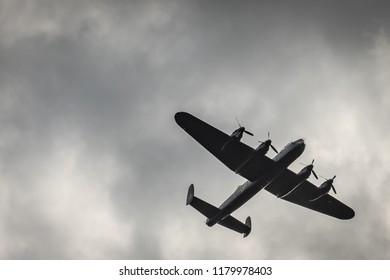 Bluntisham, Cambridgeshire, UK - Circa September 2018: Belly view of a restored WW2 RAF Avro Lancaster Bomber, part of the memorial flight showing detail of this famous aircraft a 4-engine design.