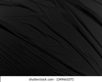 Blur Abstract Background. Black Blank Poster Background. Wrinkled Paper Texture. Texture Macro. Crumpled Fabric, Film, Paper.