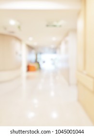 Blur Abstract Background Of Corridor In Clean Hospital. Blurred View Of Aisle In Office With Light Floor. Blurry Lobby And Waiting Area In Hotel. Defocused Empty Area For Event Hall In Shopping Mall
