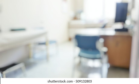 Blur abstract background inside empty patient examination room with bed in OPD ward. Blurry doctor desk for diagnosis sick people working space in hospital. Defocused interiors healthcare work place. - Powered by Shutterstock