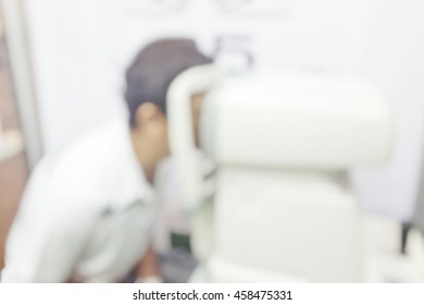 Blur Abstract Background A Man With Cabinet Ophthalmic Eye Examination. Blurry View Of Male Patient In Ophthalmology Clinic During The Study Of Computer Vision Defects.	Save Your Vision Month