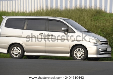 Blur abstract background of a silver van