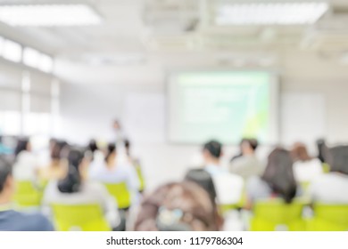 Blur Abstract Background Teacher In Front Of Classroom For Meet The Parent Day. Blurry Instructor Teaching In School. Defocus Open House Day At Campus For Kindergarten Students.American Education Week