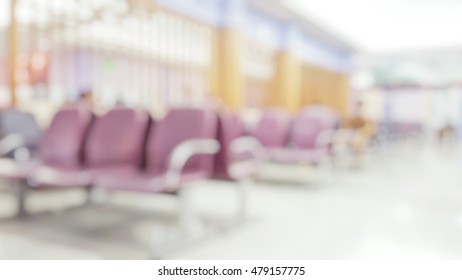 Blur Abstract Background Of Waiting Room For Patient To See Doctor In Hospital. Blurry View Of Wait Area For Passengers To Boarding At Urban Airport Gate. Defocused Seat  In Hall.