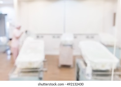 Blur Abstract Background From Window Display View Of Hospital Nursery Department With New Born Baby Bed Clips With Nurse 