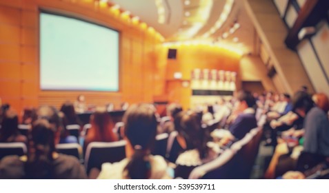 Blur Of Auditorium Room Use For Present Meeting Background