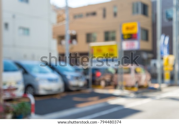 Blur of automatic car parking system in Tokyo Japan\
for background usage