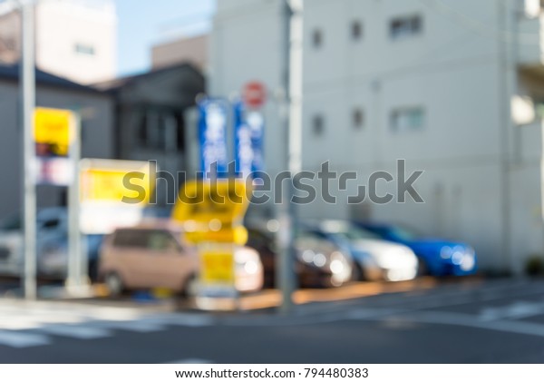 Blur of automatic car parking system in Tokyo Japan\
for background usage