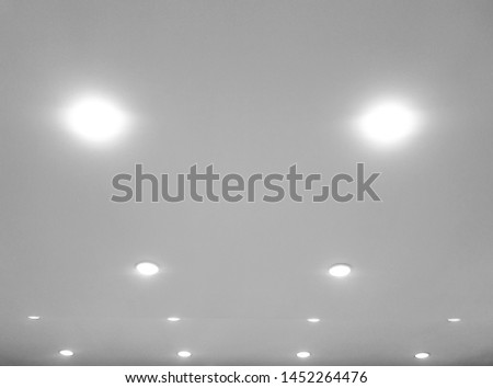  Blur background of the ceiling with some lights in soft gray tone