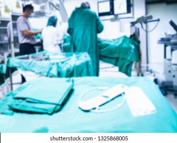 Blur background of the doctorwith nurse is conducting a patient examination in Digital Subtraction Angiography Room, DSA lab, operating room.