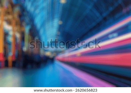 Blur Background of Dynamic Train Movement in a Historic Train Station with Striking Blue Architectural Features and Light Trails. Defocused Image for Background.