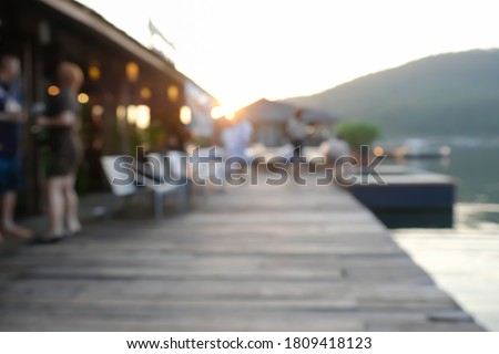 Blur background of floating restaurant or accommodation.lovely sunset