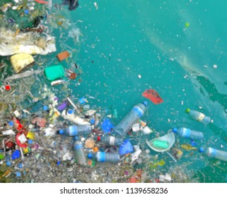 Blur Background Of Garbage Patch Pollution In Ocean 