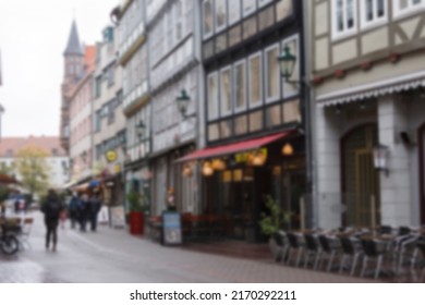 Blur Background Of German City Street With Modern And Ancient Buildings