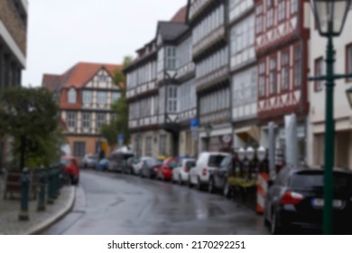 Blur Background Of German City Street With Modern And Ancient Buildings