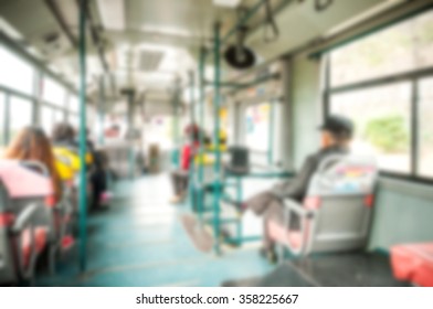 Blur background image of Public bus with passengers at Busan, Korea.