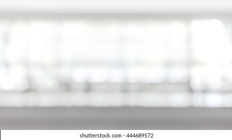 Blur Background Interior View Looking Out Toward To Empty Office Lobby And Entrance Doors And Glass Curtain Wall 