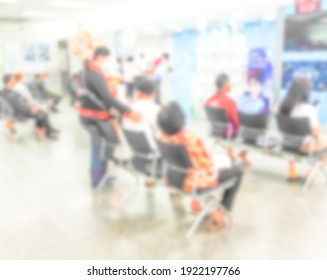 Blur Background Of People Sit Down Wait Bank Teller Cashier Counter In Office Building Lobby For Background