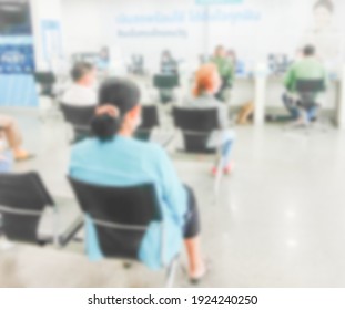 Blur Background Of People Sit Down Wait Bank Teller Cashier Counter In Office Building Lobby For Background