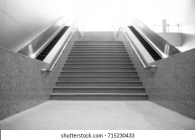 Blur background  Stair in building  Black   white theme and white gradient color effect  Concept walkway to success  Climb to high goal  Effort for success 