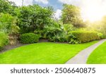 blur backyard garden surrounded by tree in green landscape background