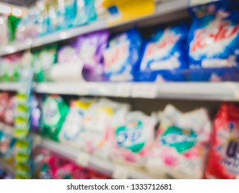 Blur Bags And Bottles Of Detergent, Comforter And Other Cleaning Products To Be Sell To Consumer In A Convenience Store