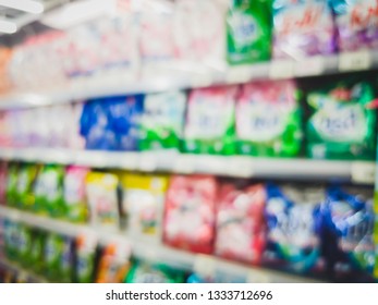 Blur Bags And Bottles Of Detergent, Comforter And Other Cleaning Products For Sale In A Convenience Store