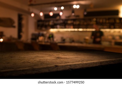 Blur Bokeh Reflection Light On Table In Pub Or Bar Club And Restaurant Christmas Party And Celebrate At Dark Night For Display Product In Brown Tone Background