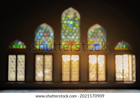 Blur and bokeh texture background for design. Windows and arches in palaces, mosques and churches.