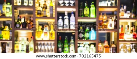 Blur bottles of spirits and liquor on bar counter Stock photo © 